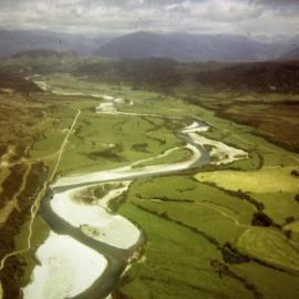 An old aerial photo of the Arahura valley which shows Malfroy's bridge center picture.