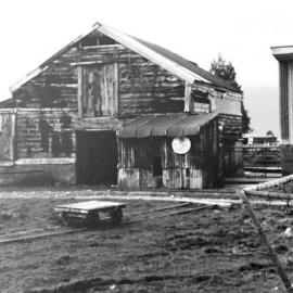 Old cow and hay storage shed plus milk trolley in foreground, Kowhitirangi  Valley.