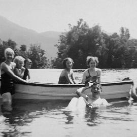 Hans bay,Lake Kaniere - Josephine Hurley ( Conning) on the far right inside the boat.ca.1940s.