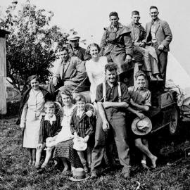 Three visitors from Mayfield Canterbury,being greeted by locals after traversing Arthur’s Pass.1930`s.