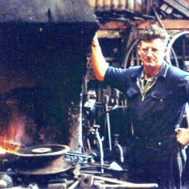 Gordon Hinks-  Blacksmith at Strongman mine .1960.