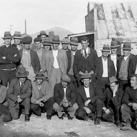 Group of miners on Top Road outside Co-op or Collins store.Waiuta.ca,1920`s - 30`s.
