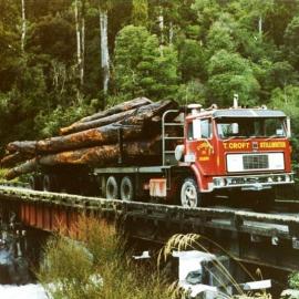 T Croft Transport hauling native logs to the Ruru Sawmill
