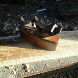 Smoothing plane that worked at Denniston being used to plane some wet pine