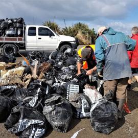 Volunteers clean Cobden beach after Cyclone Fehi ripped open Cobden rubbish dump *PHOTO ALBUM*