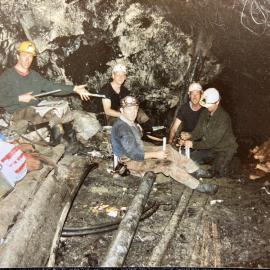 Making up the dummies for tamping up the shot holes at  the Strongman Mine, December 1988.