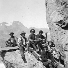 ALBUM - Carrying timber up the Tasman Glacier for building Haast Hut.ca.1915 -16.