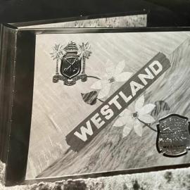 Photo album presented to Queen Elizabeth from Westland during her first visit to New Zealand in 1954