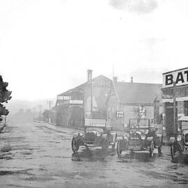 ALBUM - Baty`s Garage - the old two storey place in the background is the Park Hotel,Guinness St,Greymouth. 