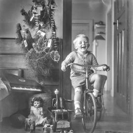 We made Christmas ornaments from the foil milk tops