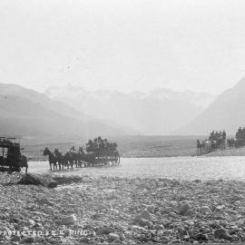 Coaches lined up to cross the Bealey River