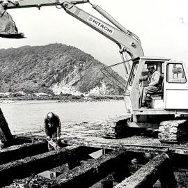 Dismantling Greymouth Wharf with operational Cobden Quarry in background.1987.
