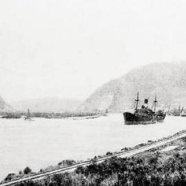 The Coolana being towed out of the Grey River, Greymouth, with a cargo of timber for Melbourne.