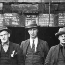 Tom King, tall man in the centre -  managed the State mines on the West Coast - photographed outside the Liverpool Mine.