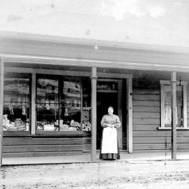 Annie Lister, nee Hay, outside her shop in Granity.