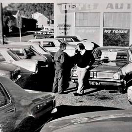 John Moore back in the day selling cars.