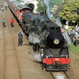 Engine J1211 heading special train at Moana, 1989