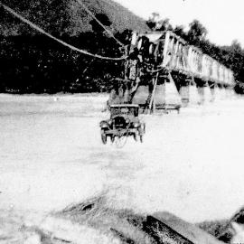 Dr Teichelmann`s Buick roadster being cabled across Wanganui River north of Hari Hari 
