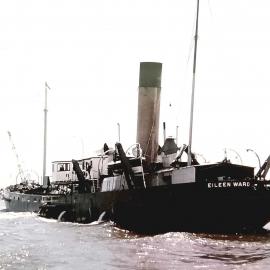 The Westport Harbour Board suction dredge Eileen Ward at work by the harbour entrance, 1966