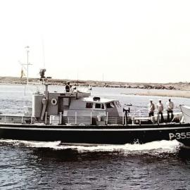 Fisheries patrol vessel H.M.N.Z.S. Kahawai enters the Grey River, 1960s