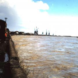 Grey River in flood, train on Mawhera Quay
