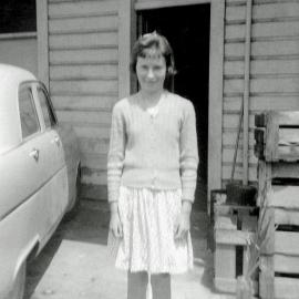 Sharon Lingard at the back of the Dominion Hotel in Blackball. Early 1960s.