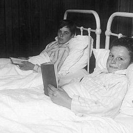 John Rodden (front) and Robert Bligh in Waiuta hospital, recovering after being lost in the bush.June,1934.
