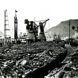 Fully loaded coal trucks from the nearby mines waiting to be loaded into colliers at Greymouth Wharf 