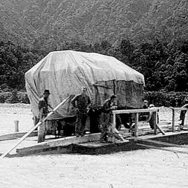 Big Wanganui Hari Hari - taking supplies across for South Westland after bridge wash out .ca.1930`s - 40`s.