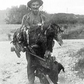 John William Molloy (Snr), displaying his "Bag" of ducks outside his Molloy family home at Kotuku.ca.1930`s.