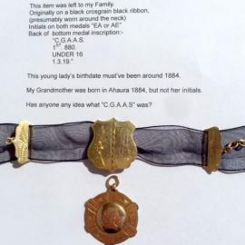 Medallion on ribbon left to my family.