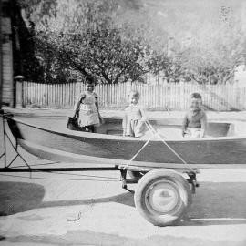 Naireen, Danny and Arthur Bass in Diana -  Roy Evans boat outside the Blacksmith Shop .