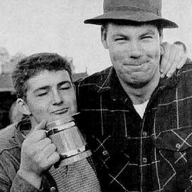 Wayne Muir, winner of the West Coast beer drinking contest at the Moonlight centennial.1965.