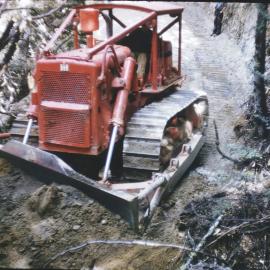 Shots of bulldozers being used on West Coast.1960`s.