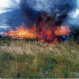 Frank and Ivy Klempel house at Moana being used for fire practice.1970`s.
