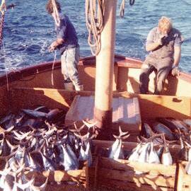 Bugs De Goldi and Chubby Waterman on the boat " Debbie Jane". Mid 1970`s.