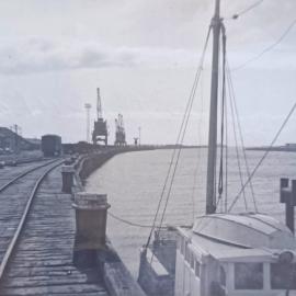 Greymouth Wharf mid 1960s. Cabin of the fishing vessel Lady Luck in the foreground.