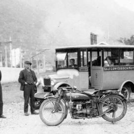 J Low picking up his new bus from the Rail at Otira (with motorbike in foreground)