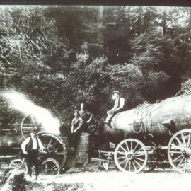 Traction engine hauling a boiler on the road between Blackwater and Waiuta.