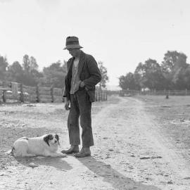 Unidentified man and dog, South Westland. 27 Dec 1947.