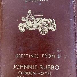 Motor Driver`s licence in old leather holder .