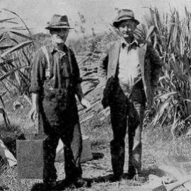 Mr T. Casey (Okarito 'cranery' Ranger) and Mr S. King (Westland Commissioner of Crown Lands). 1944-12-27