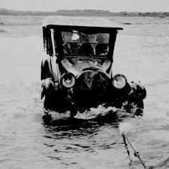 Getting a tow through the Karangarua River .1939.