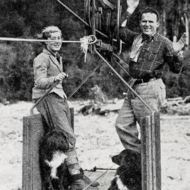 Crossing the Fox River in a cage propelled along an aerial ropeway by using a hand-turned wheel.1935.