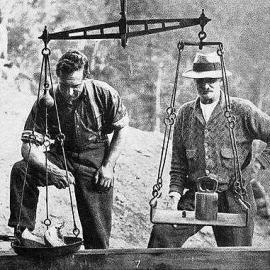 Gold being weighed at the Alexander Mine, Reefton district.1932.