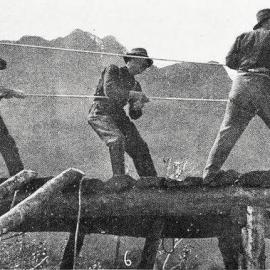 Hauling gear along a cableway over the Fox River.1930.