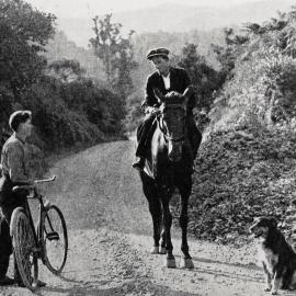  A meeting between a cyclist and a mounted rider in the Buller Gorge.1929.