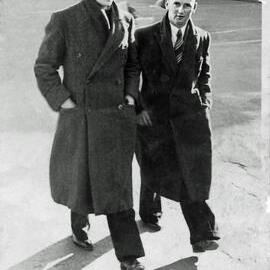 Colin Bell, and Jack Hartigan, walking down Mackay Street Greymouth.ca.1930`s - 40`s.