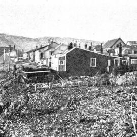  A view of the houses, terrain and surrounding hills at Denniston.1938.