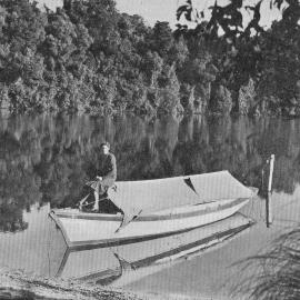A boat and its reflection at Lake Mapourika, South Westland.1939.